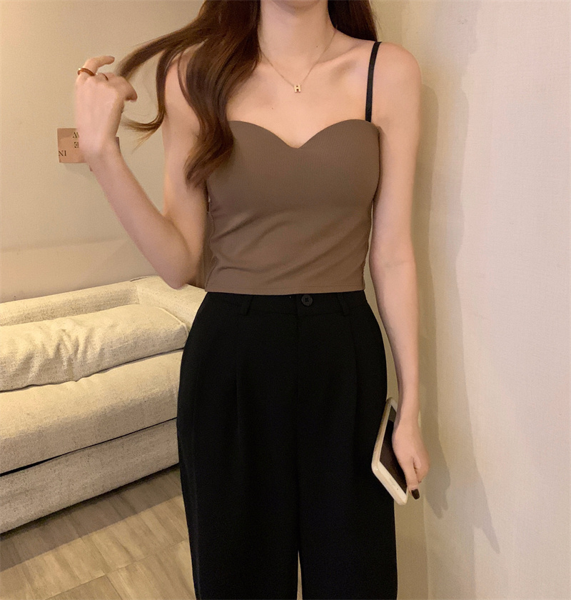 For winter women, wear a French-style small halter top with a cushioned base layer inside and a sleeveless, slimming short top outside pic 3