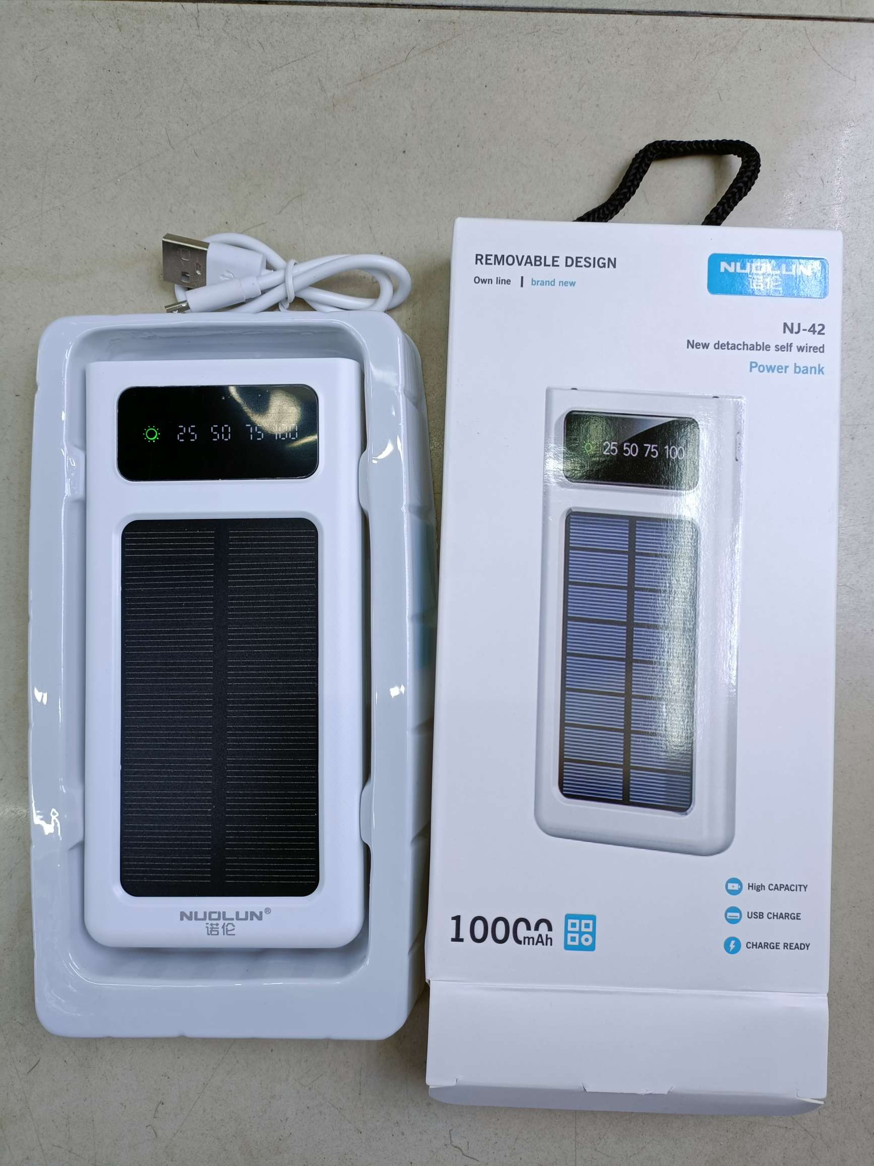 The solar charging bank 10000 MA comes with a four-wire mobile power supply with lights full figure