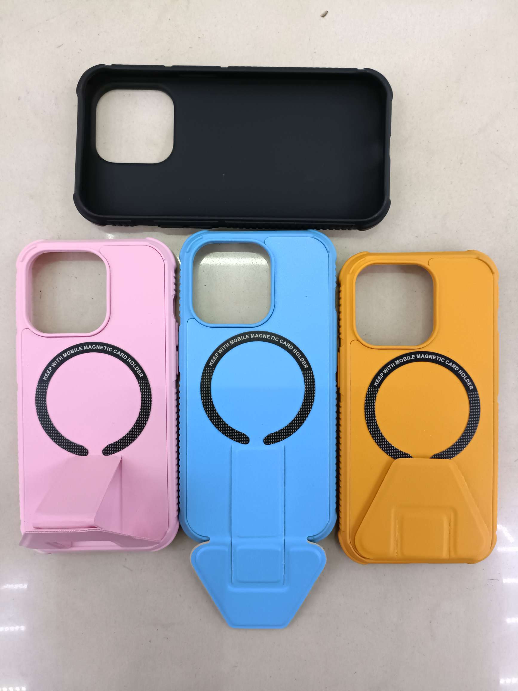 Anti-drop magnetic bottom stand phone case