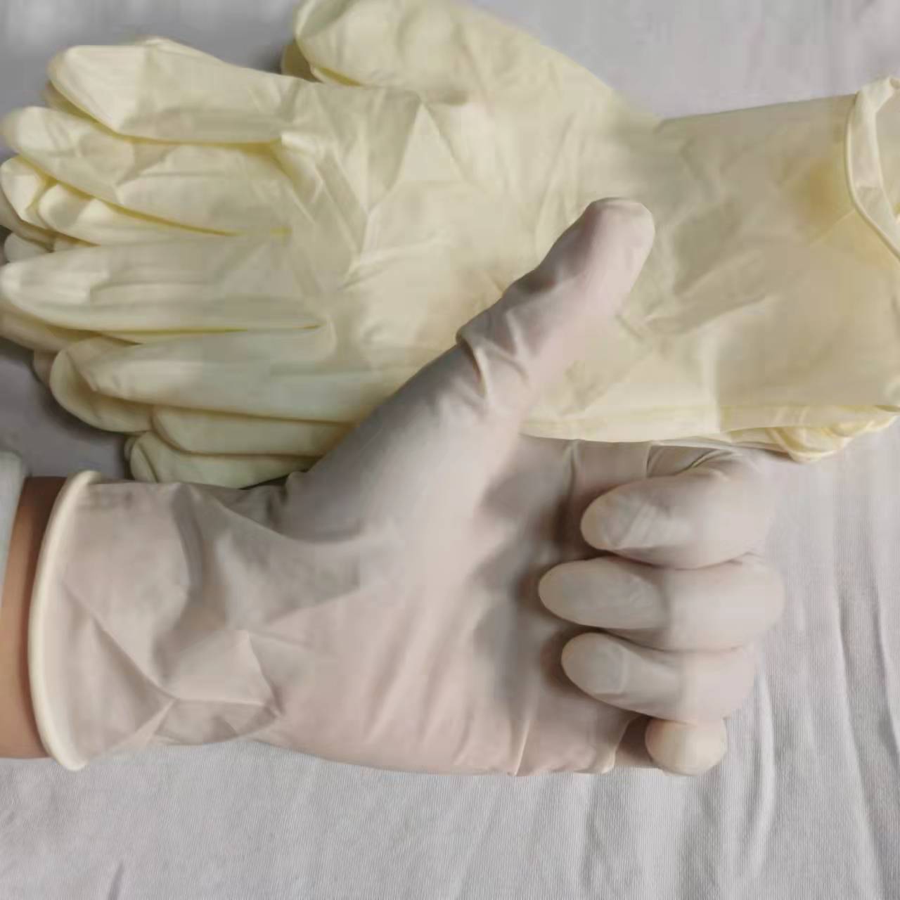 Disposable gloves Rubber latex gloves Food grade powder free laboratory protection dental examination beauty thickened thumbnail