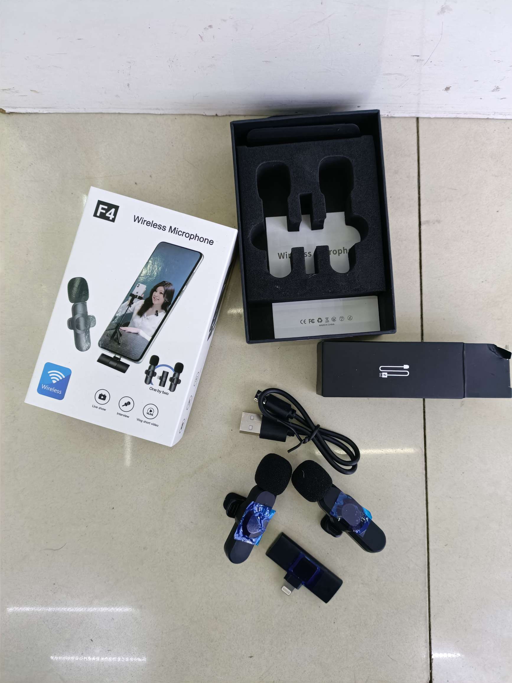 F4 Apple's one-drag two wireless lapel microphone details Picture