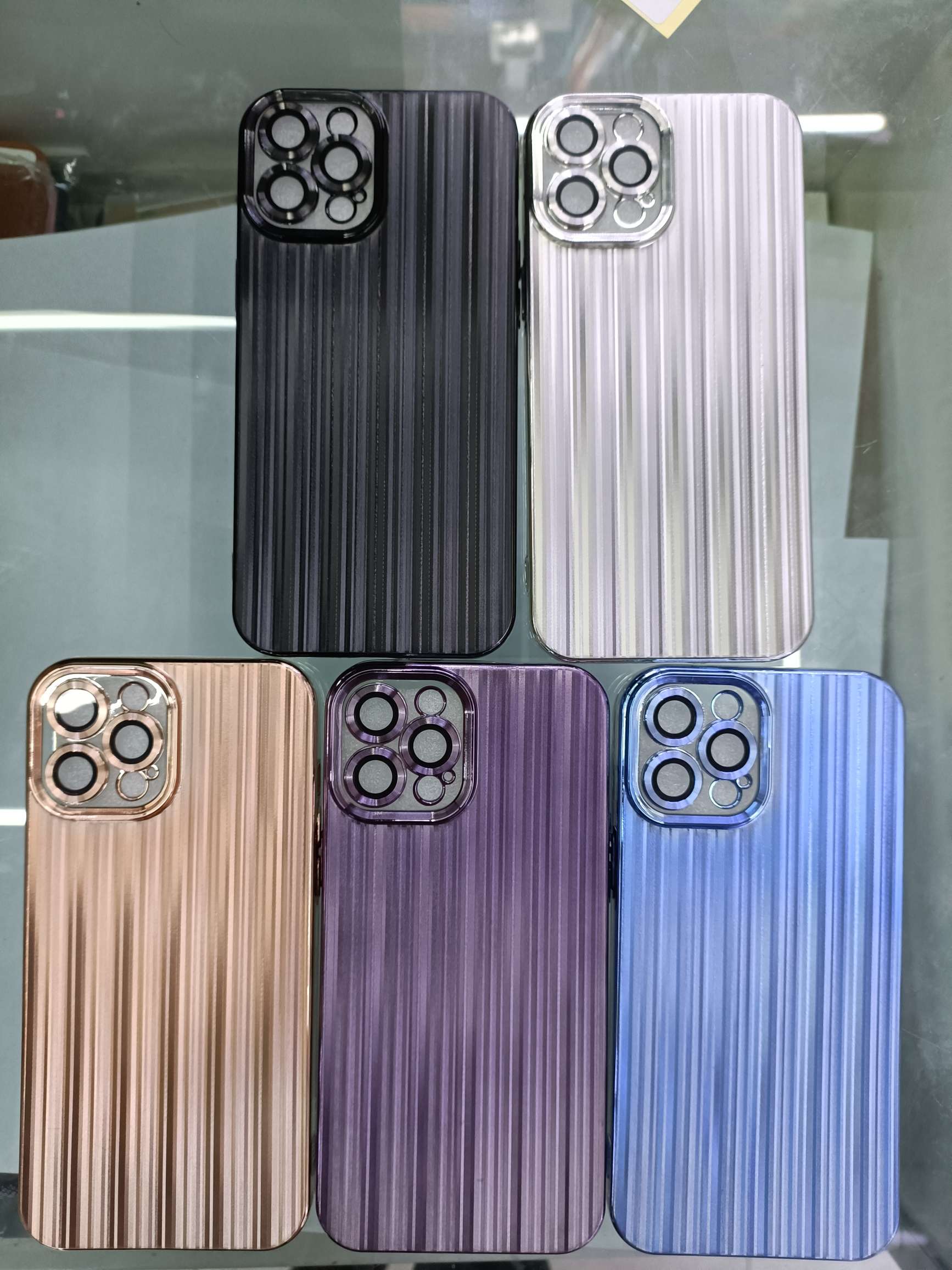 Electroplated streamer wire-drawing lens film bottom with dust screen mobile phone protective cover