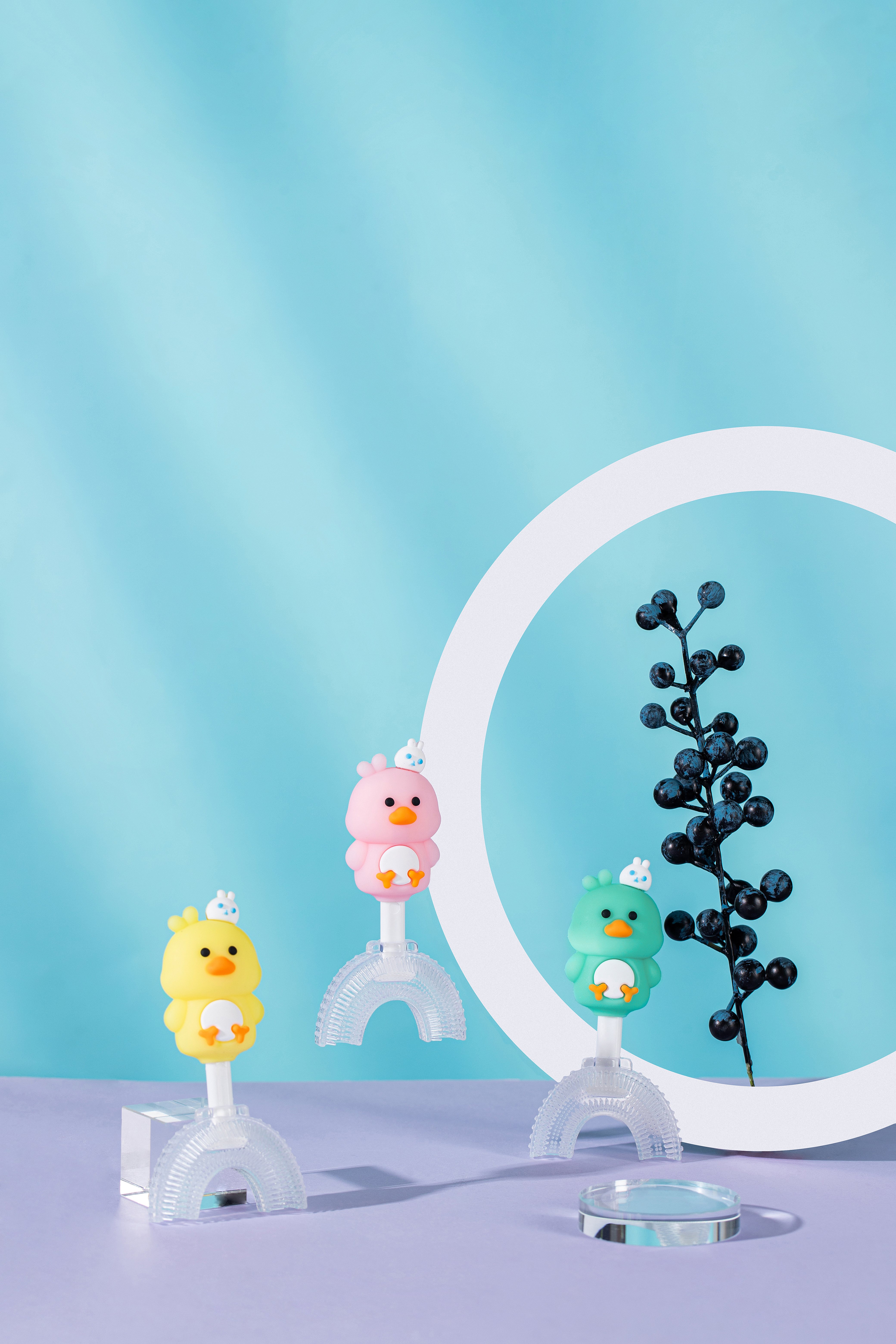 Duckling toothbrush with suction base and travel case