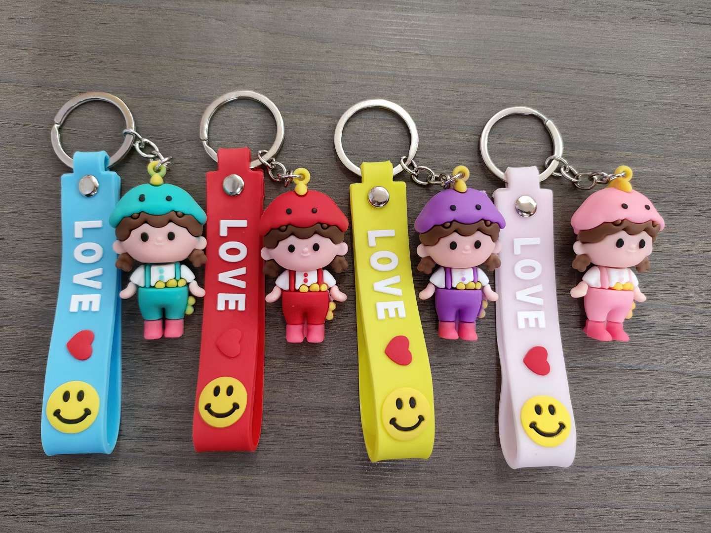 Little boy and string a series of keychains