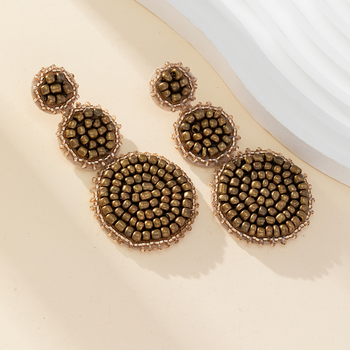 European and American creative national wind earrings women's round earrings Bohemian handmade beaded rice beaded earrings
