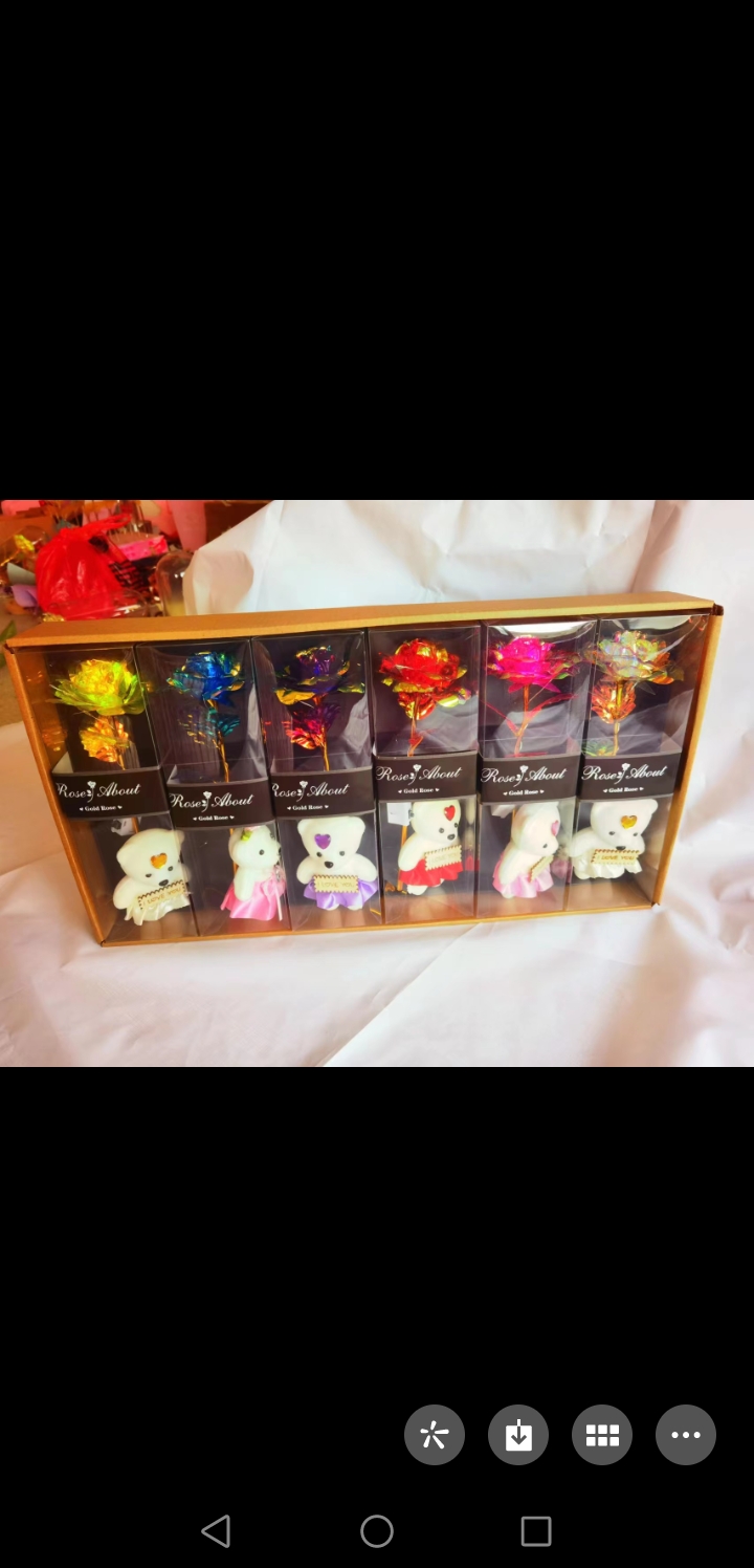 A single rose with gold foil in a transparent box and a bear as a Teachers' Day and Valentine's Day gift details Picture