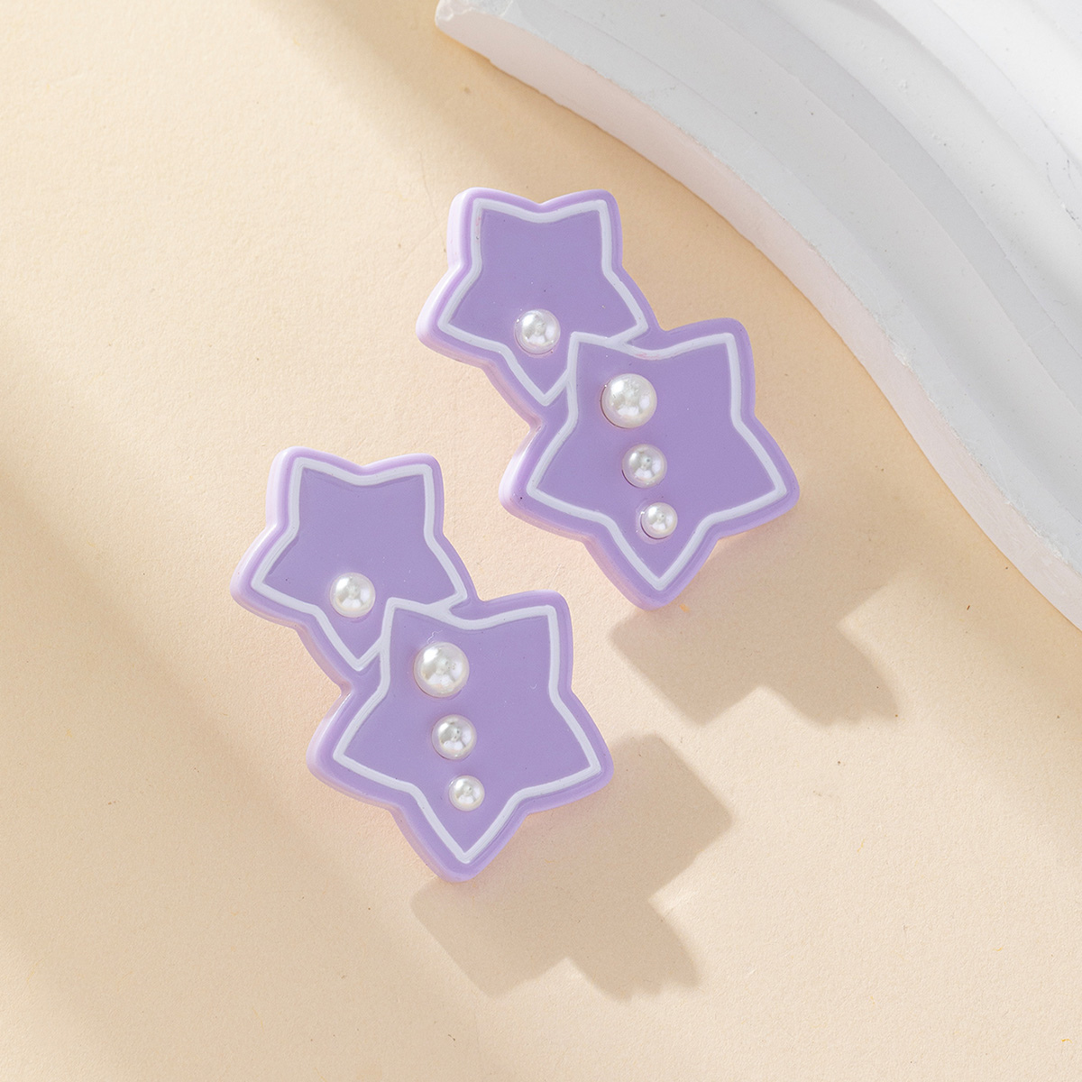 New sweet and fresh five-pointed star earrings, Korean version, niche design sense acrylic silver needle earrings