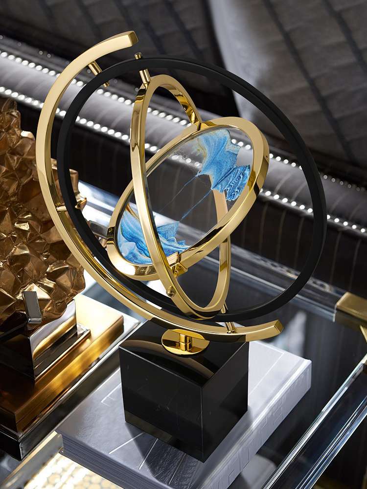 A modern, light luxury and creative office desk, study, living room and wine cabinet decoration, as well as a housewarming gift