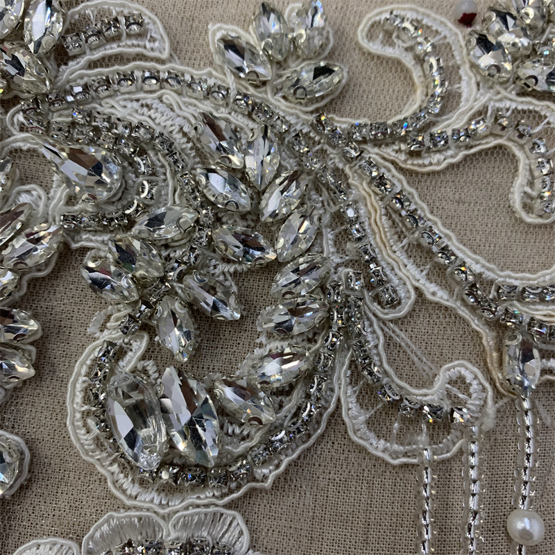 Fashionable and trendy wedding dresses, hand-stitched beaded lace decals details Picture