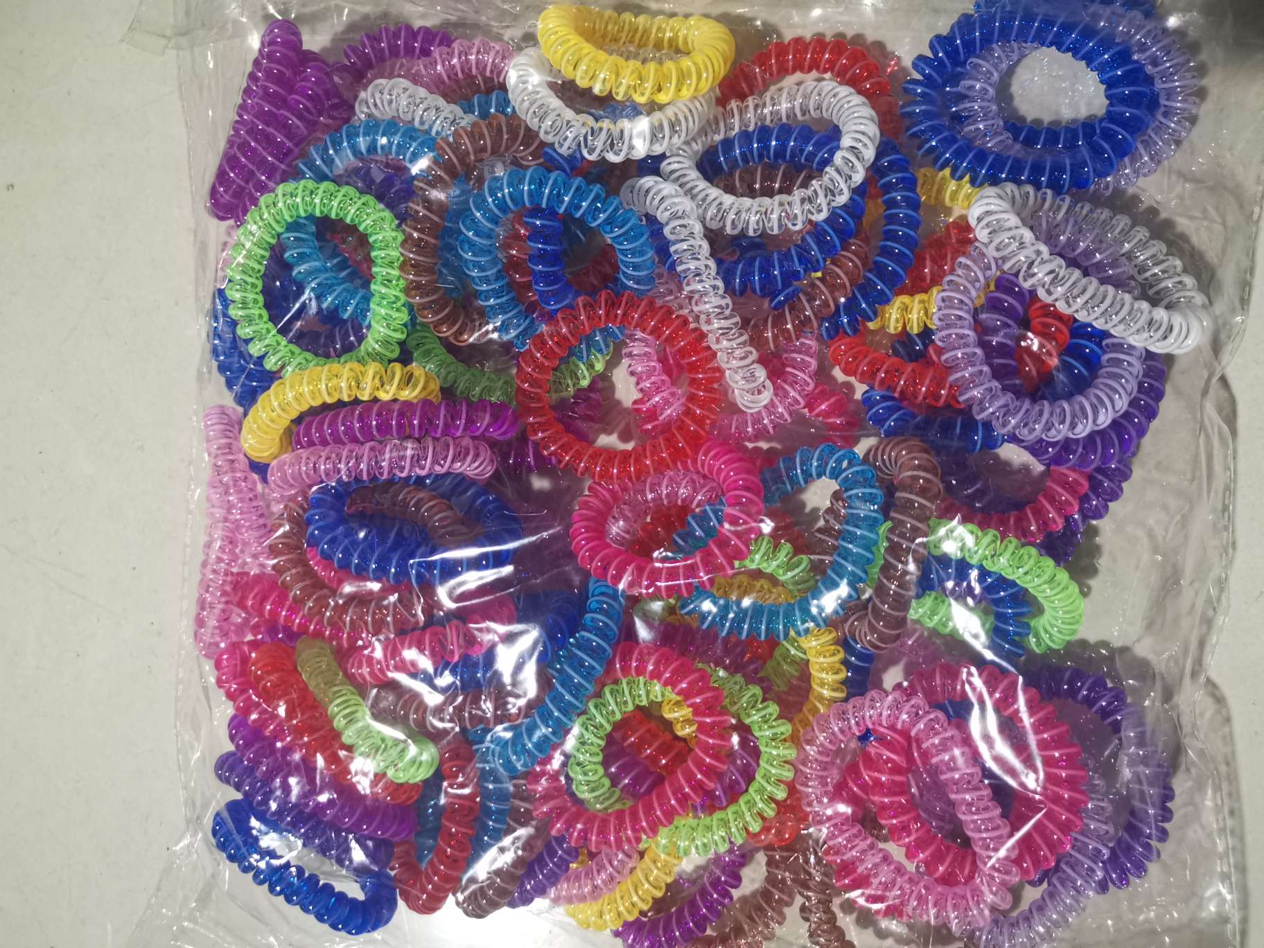 A bag of 100 pieces of a mix of telephone line, high-elasticity and thickened wristbands, hair styling accessories and mixed colors details Picture