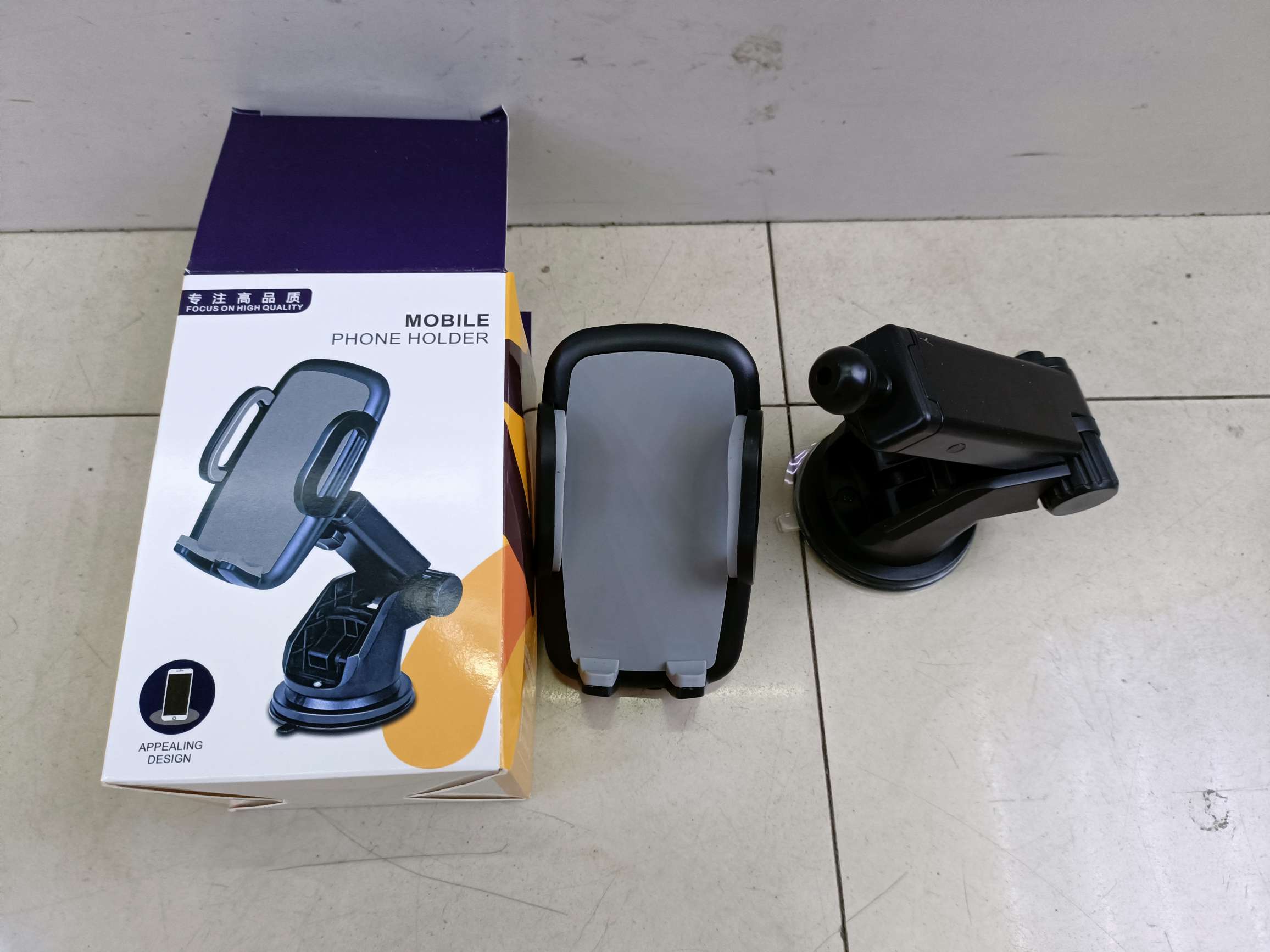 车载手机支架/旋转出风口夹/手机支架白底实物图