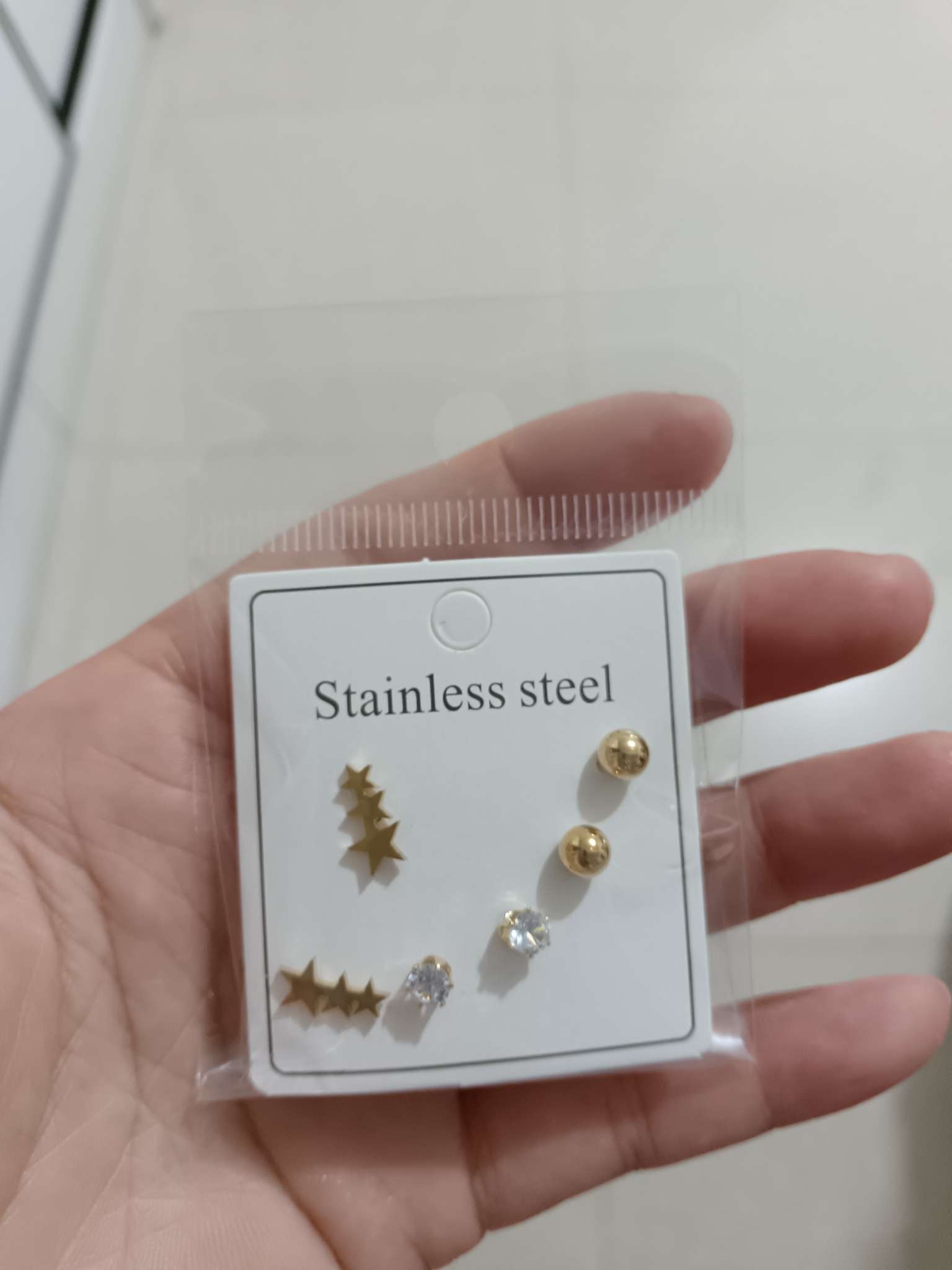 Three pairs of zircon stud basic earrings. Three pairs