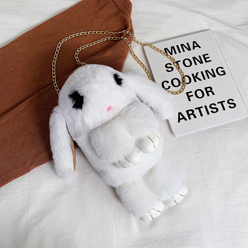 In 2023, we offer wholesale imitation rabbit fur dead rabbit bags, crossbody bags, cute rabbit bags, adorable rabbit bags, student bags, rabbit mobile phone bags. We have exquisite gifts in stock, including pink rabbits and black-eyed rabbits pic 16