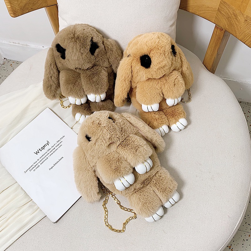 In 2023, we offer wholesale imitation rabbit fur dead rabbit bags, crossbody bags, cute rabbit bags, adorable rabbit bags, student bags, rabbit mobile phone bags. We have exquisite gifts in stock, including pink rabbits and black-eyed rabbits pic 14