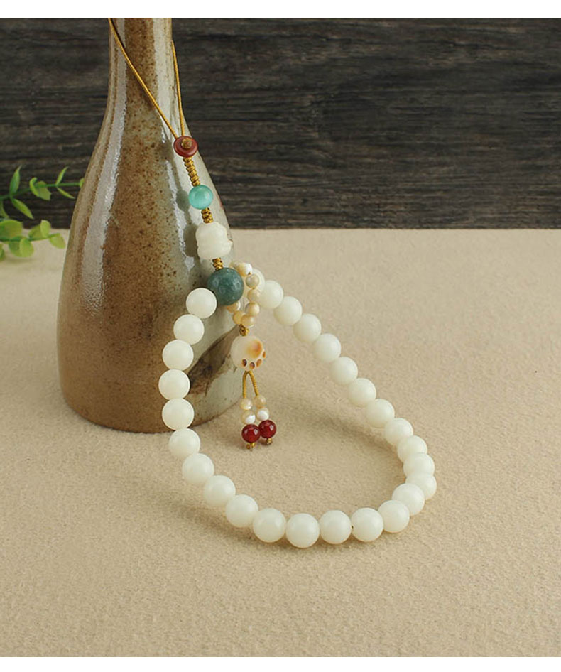 中国风白玉菩提短款手机链挂件跑环防丢挂饰品中国风白玉菩提短款手机链挂件跑环菩提根猫爪手腕挂绳防丢挂饰品详情5