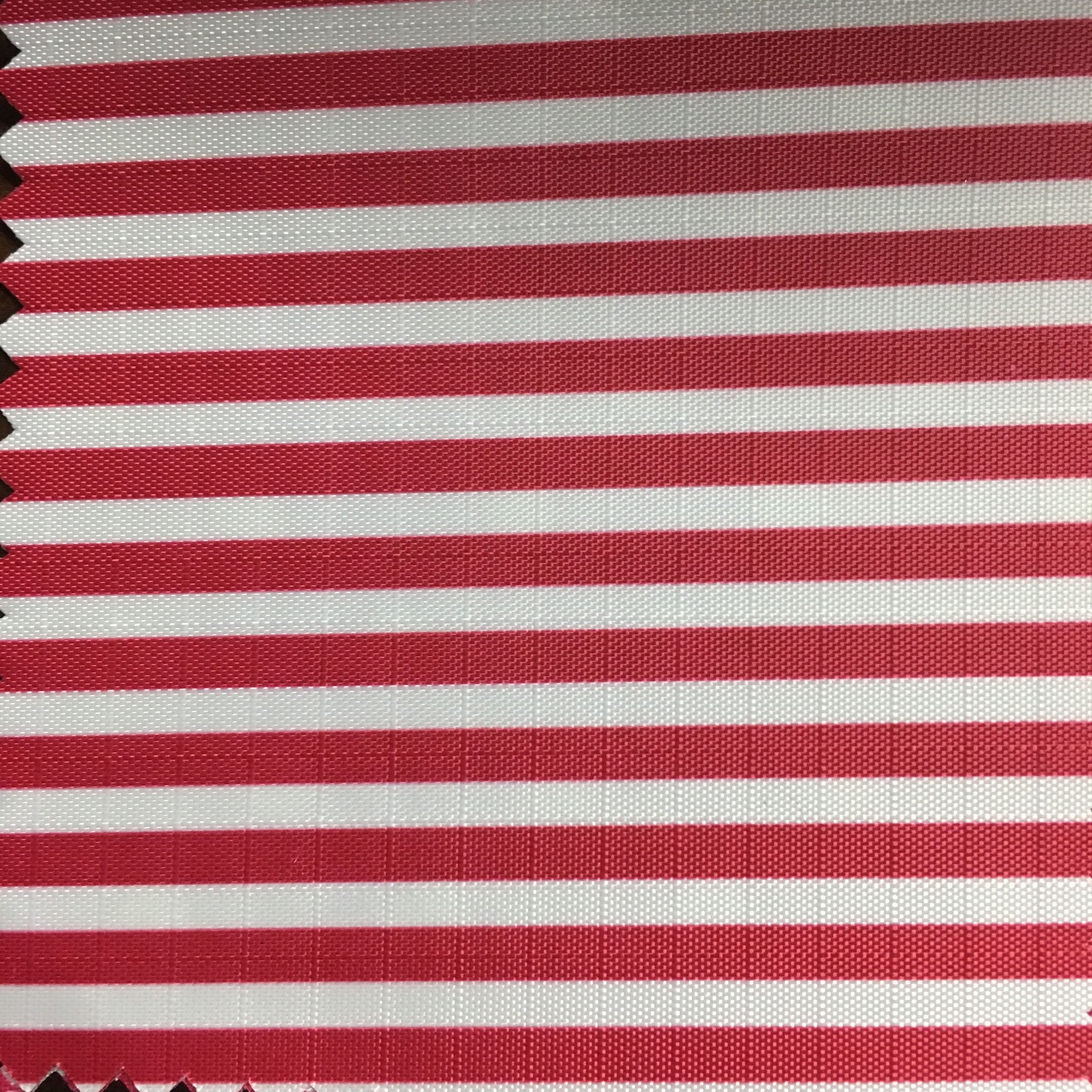 Wholesale of 210d four-section printed Oxford cloth with red stripes and checkered fabric for high and medium-grade luggage Application Scenario
