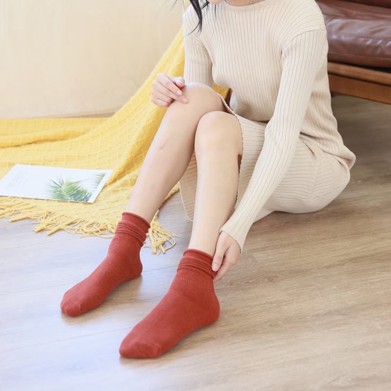 喜朗登春秋季纯色女士中筒袜 水晶羊绒自然卷堆堆女袜子 厂家批发2016