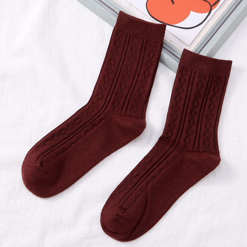 喜朗登春秋冬季纯色女士中筒袜 双针提花菱形格羊绒女袜子 厂家混色批发2060详情6