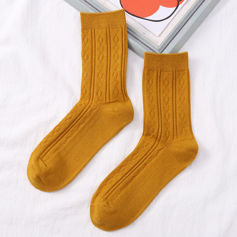 喜朗登春秋冬季纯色女士中筒袜 双针提花菱形格羊绒女袜子 厂家混色批发2060详情3