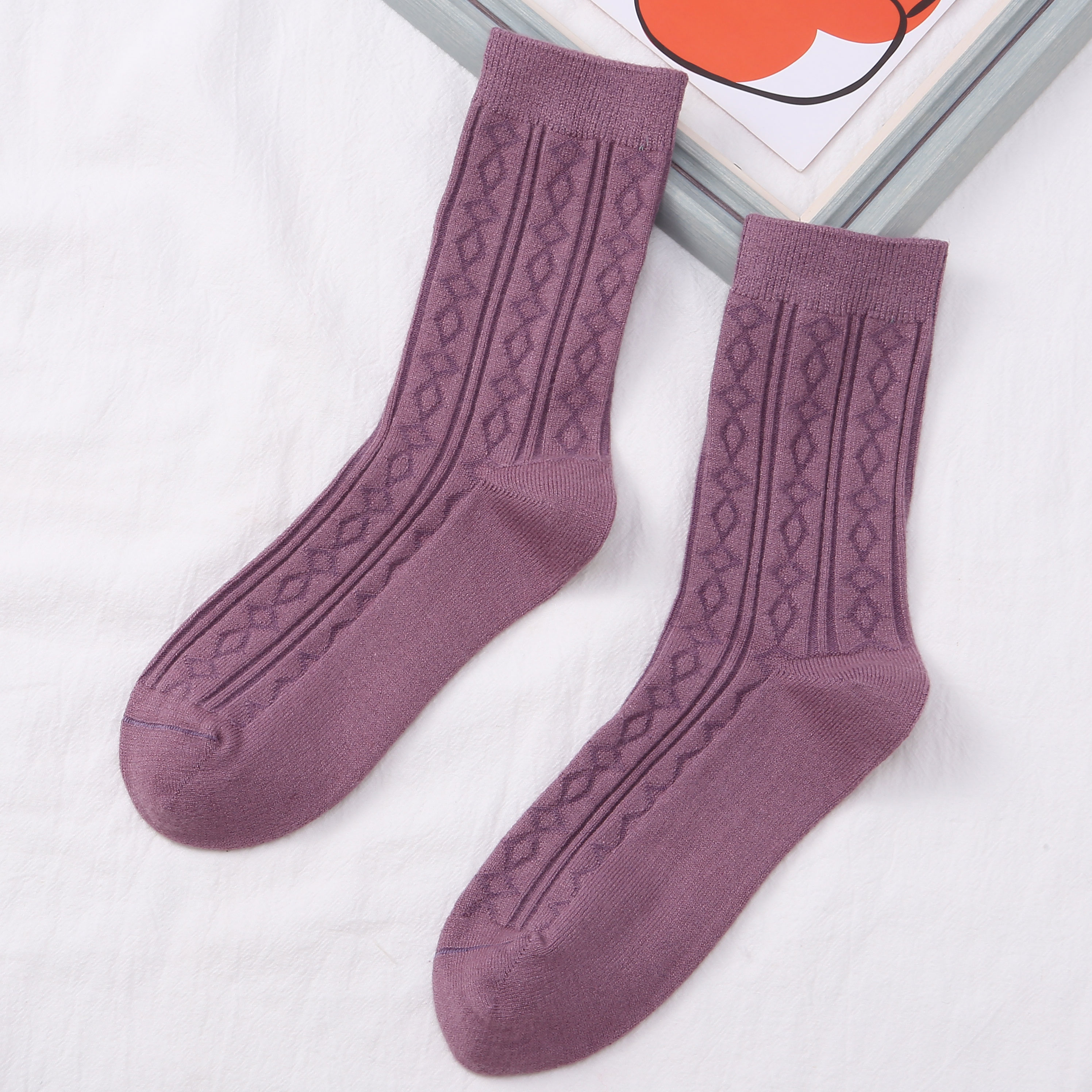 喜朗登春秋冬季纯色女士中筒袜 双针提花菱形格羊绒女袜子 厂家混色批发2060详情9