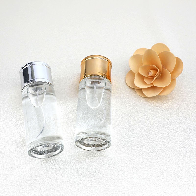Factory direct sales of 50ML transparent straight round perfume glass bottles, portable spray dispensing glass bottles, and empty cosmetic bottles Specification image