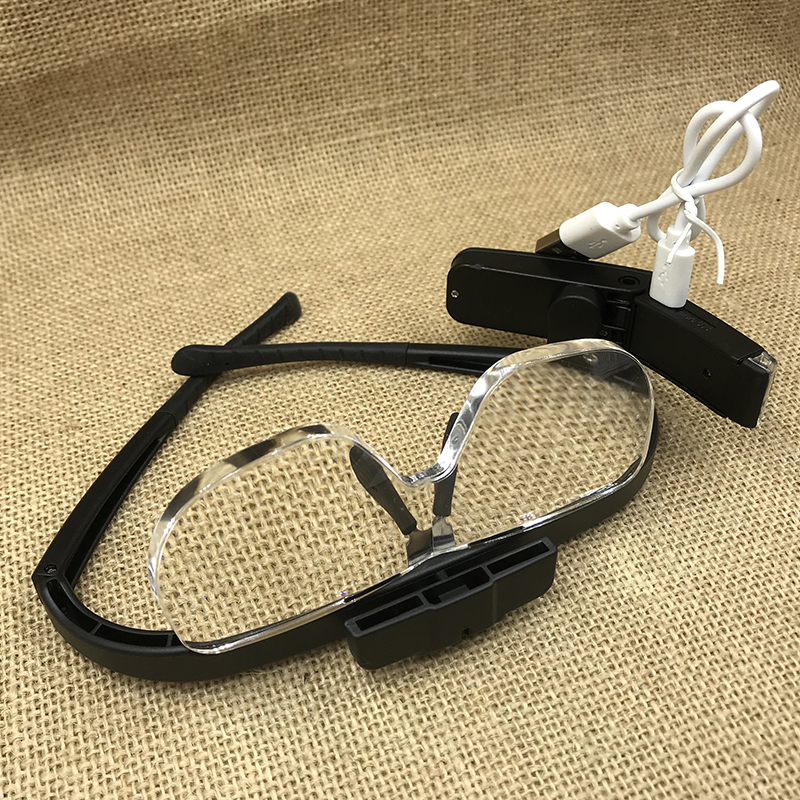 The new 11642DC glasses-style magnifying glass with a light and USB charging function is designed for the elderly to read newspapers and books. It features multiple lenses with interchangeable magnification details Picture