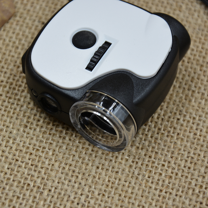 55x portable mini microscope LED lamp UV banknote detector lamp Antique and jewelry high-power magnifying glass 7004D details Picture