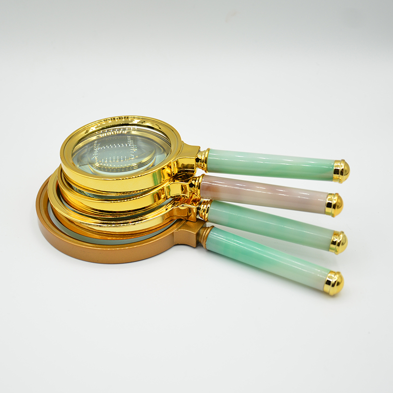 Jinghui Factory direct sales hand-held jade-handled plastic gold-plated frame magnifying glass for the elderly to read newspapers, collect stamps Jinghui Factory direct sales hand-held jade-handled plastic gold-plated frame magnifying glass for the elderly to read newspapers, collect stamps