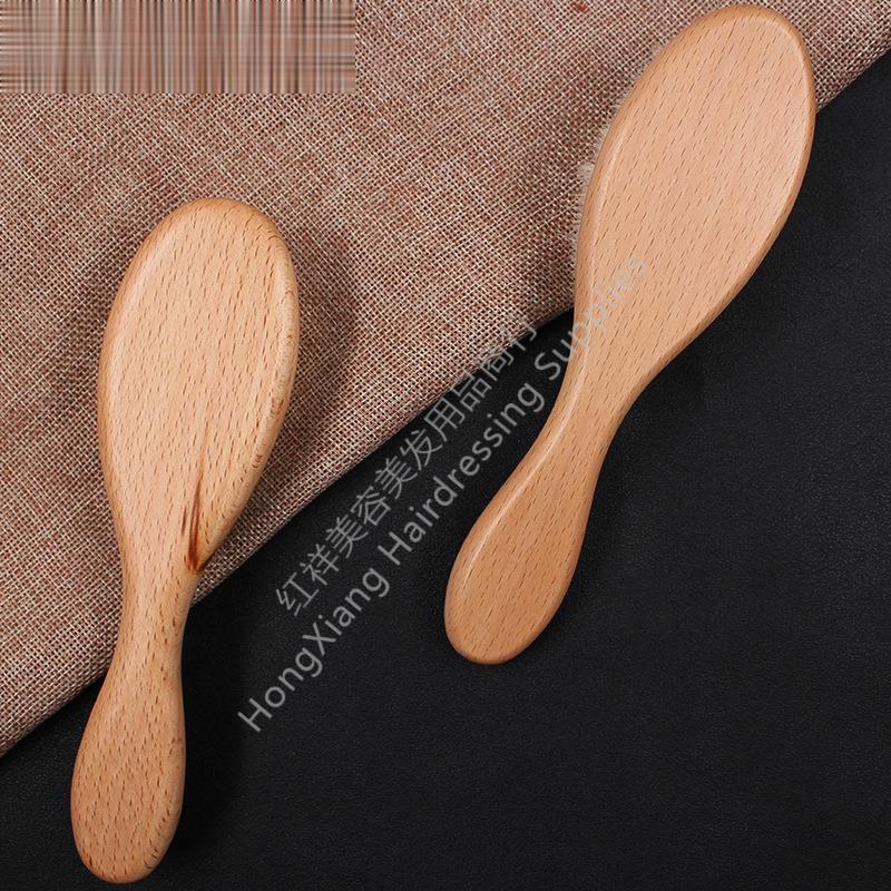 Hand Holding Wool Beech Beard Brush