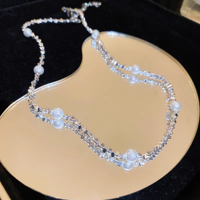Broken Silver A Few More Than Two Beads Necklace undefined