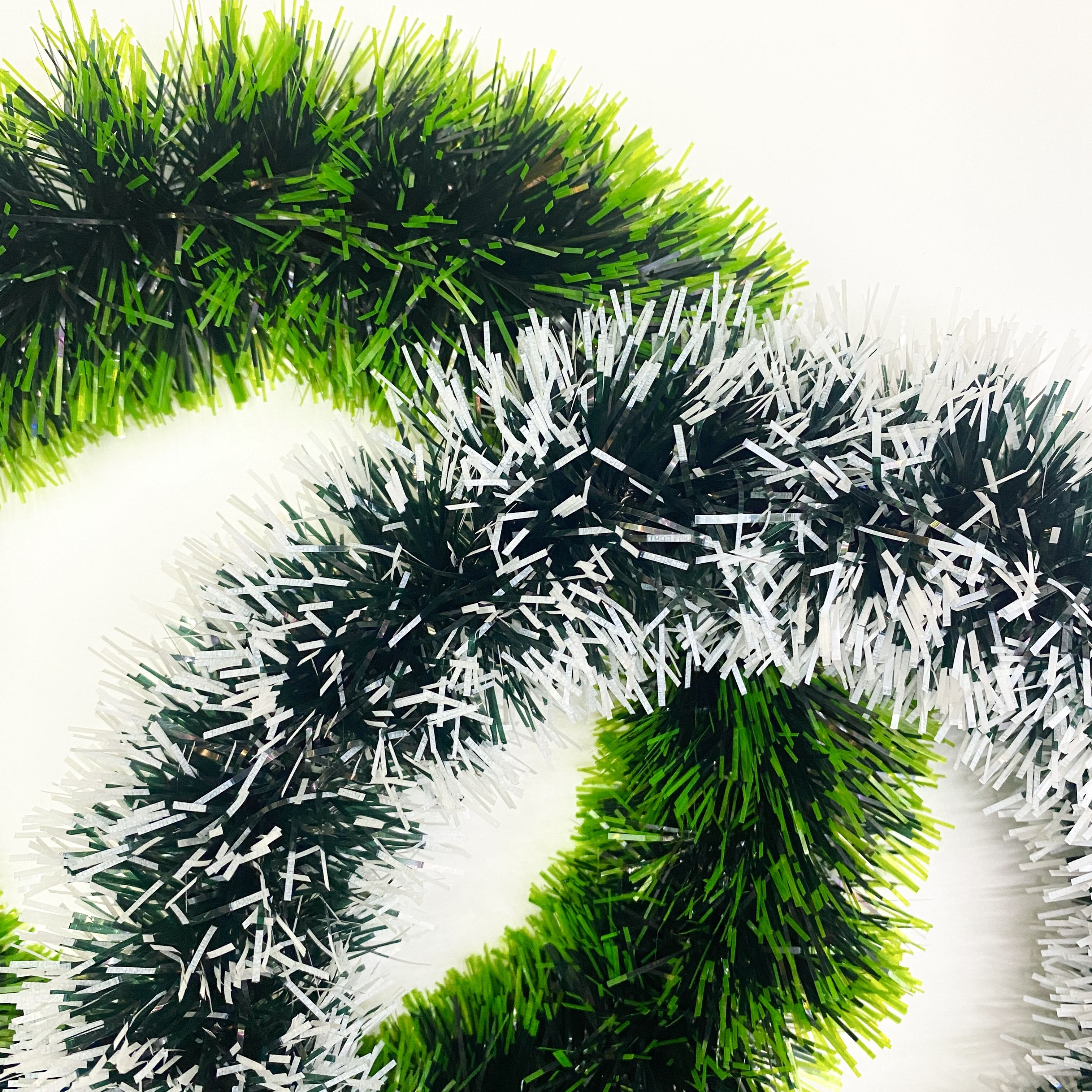 A dark green garland with white edges Application Scenario