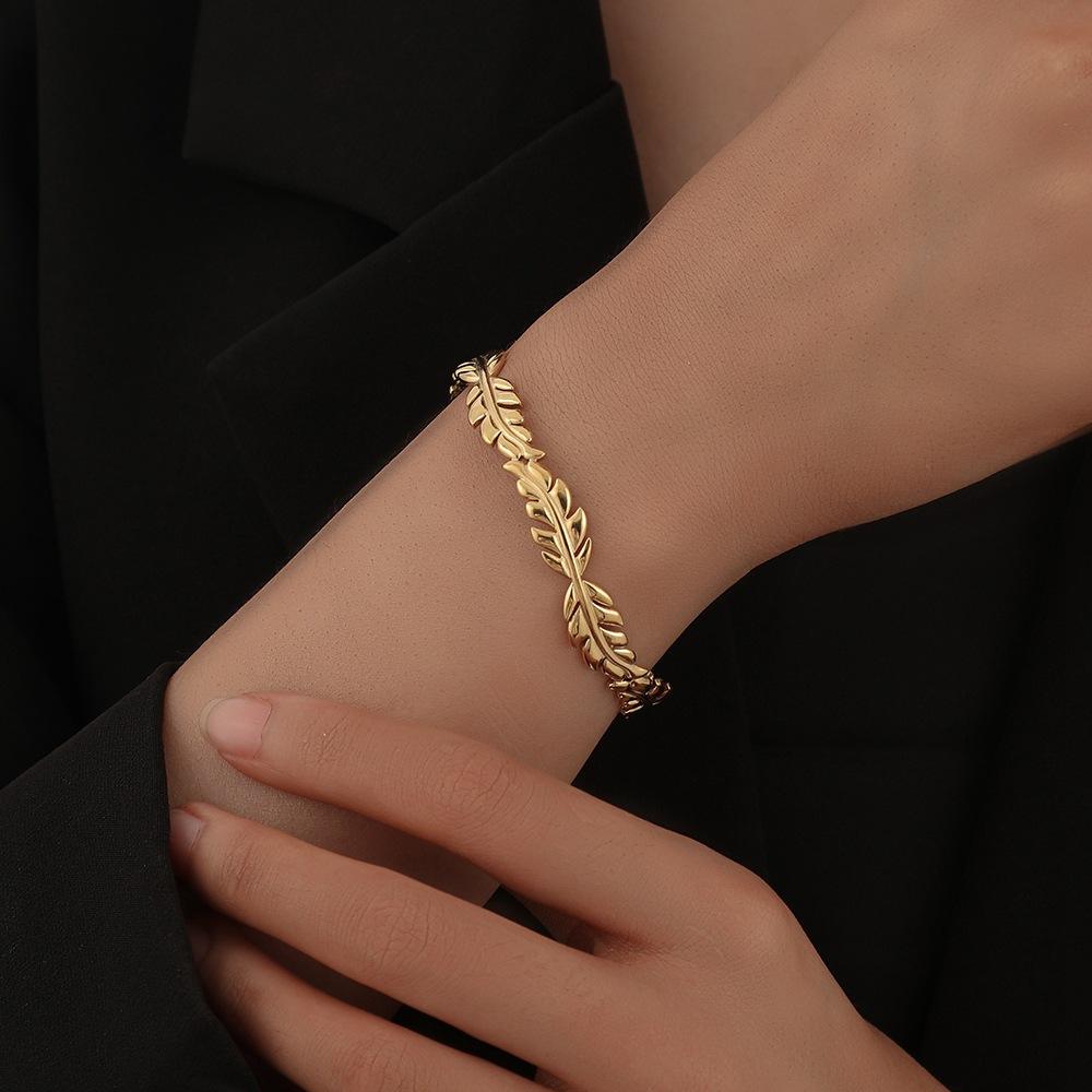 ins European and American style stainless steel new leaf splicing open bracelet Titanium steel trendy, individual, retro and exaggerated bracelet Leaf open titanium steel bracelet Women's creative hydraulic stainless steel bracelet Specification image