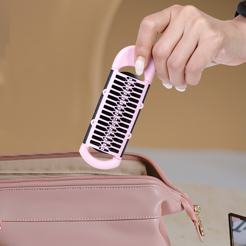 KAI 日本进口贝印 带刷头可折叠自清洁头发刷子可在折叠发刷时自动收集缠结的毛发随时清洁梳子日用百货详情图2