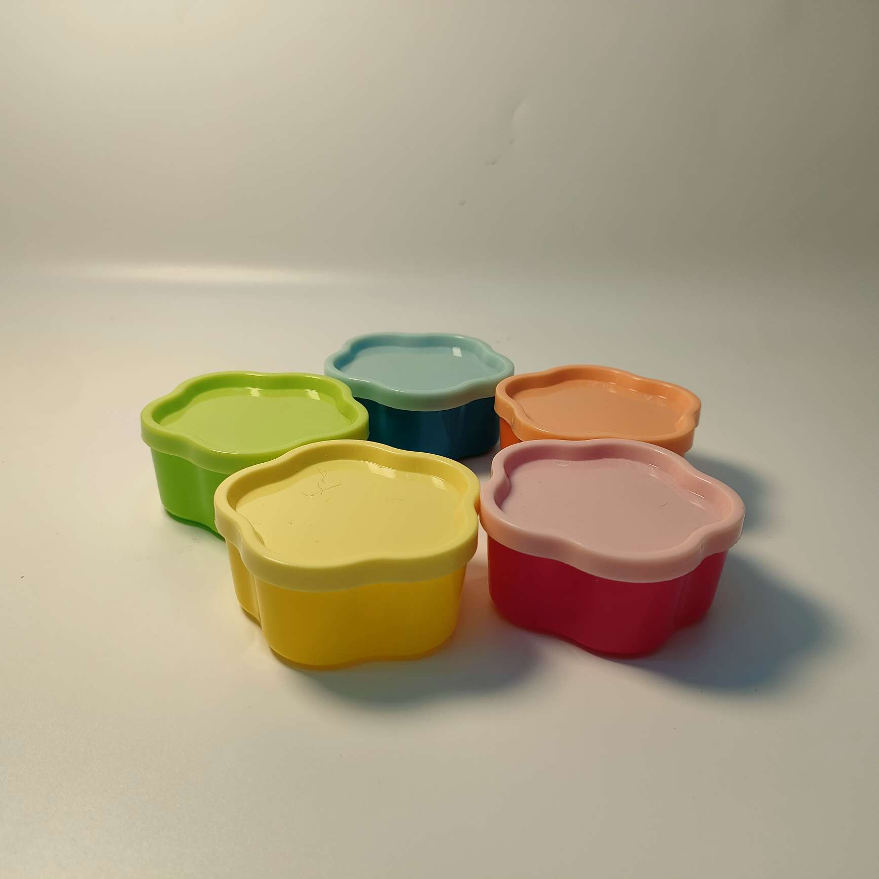 A set of 5 small mini plastic boxes with LIDS in the shape of plum blossoms