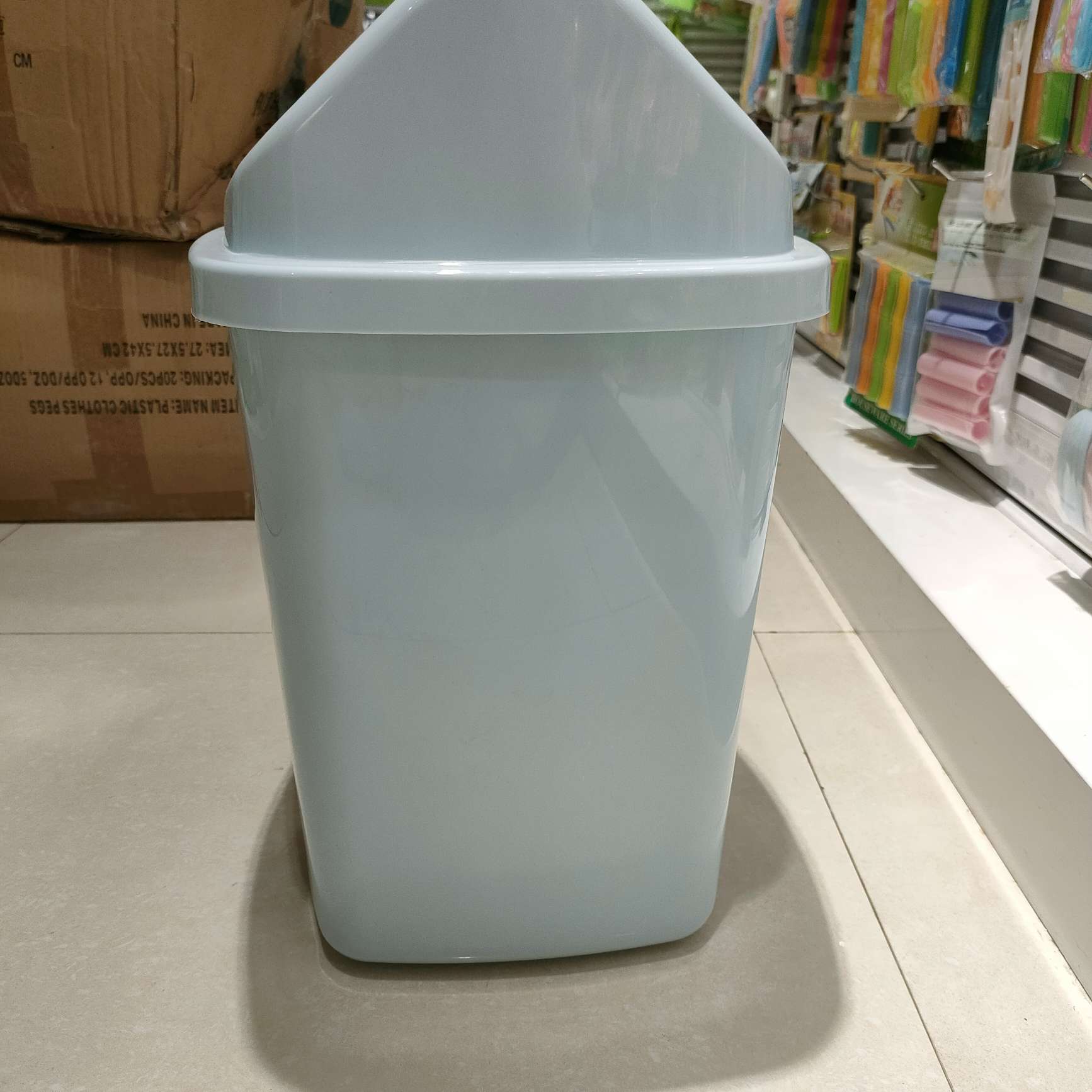 The bathroom trash can has a narrow lid. The toilet flap has a narrow rectangular slit with a lid. The living room flap is a household type Specification image