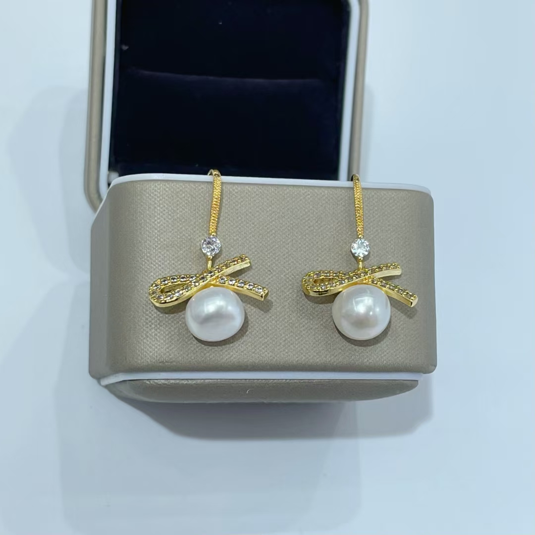 Factory direct sales of exquisite natural pearl bow sets details Picture