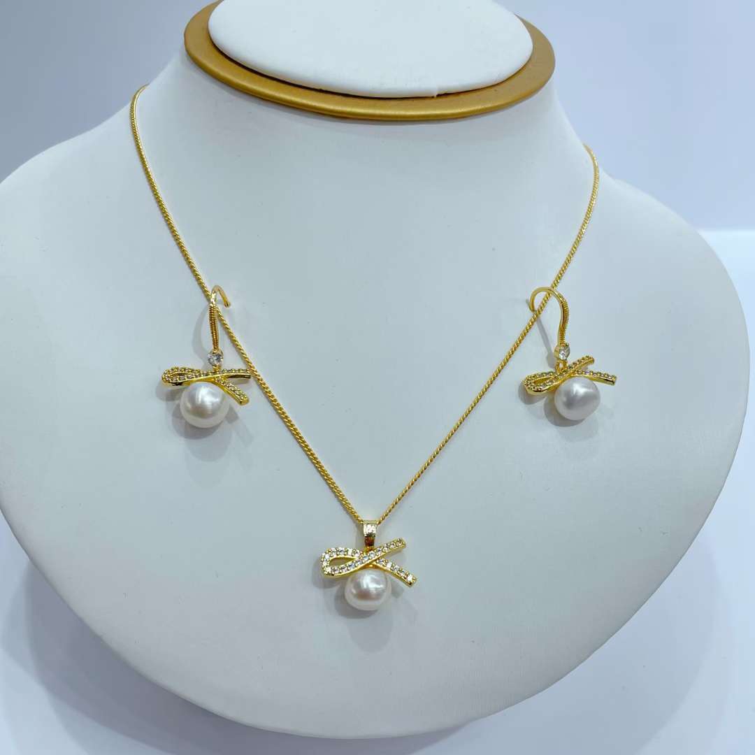 Factory direct sales of exquisite natural pearl bow sets Item Picture