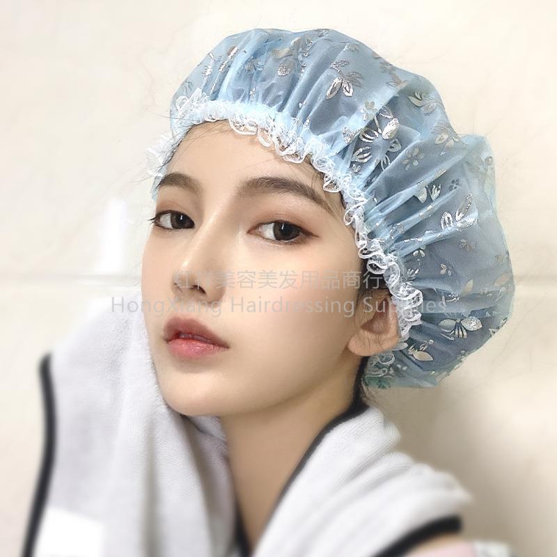 答：网红爆款/沐浴帽/防水网纱/烫银空/浴帽女/双层淋浴/洗澡帽/可爱家用白底实物图