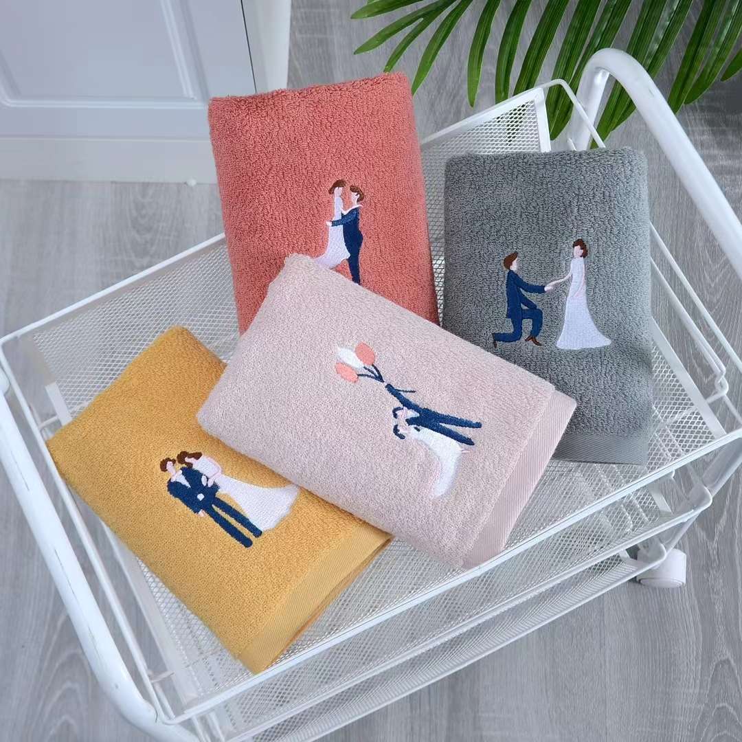 Couple towels made of pure cotton, absorbent and embroidered, with couple portrait logos as gifts details Picture