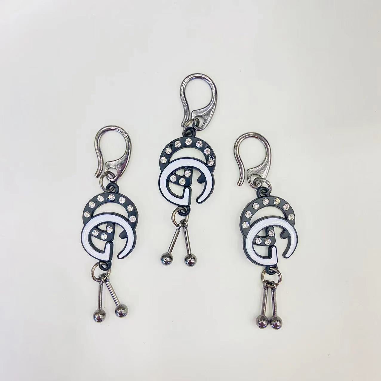 Fashion alloy accessories, clothing accessories, clothes and pants pendants, letter style, diamond decorative buckles, luggage accessories, customizable hardware chains, factory direct sales, source supply