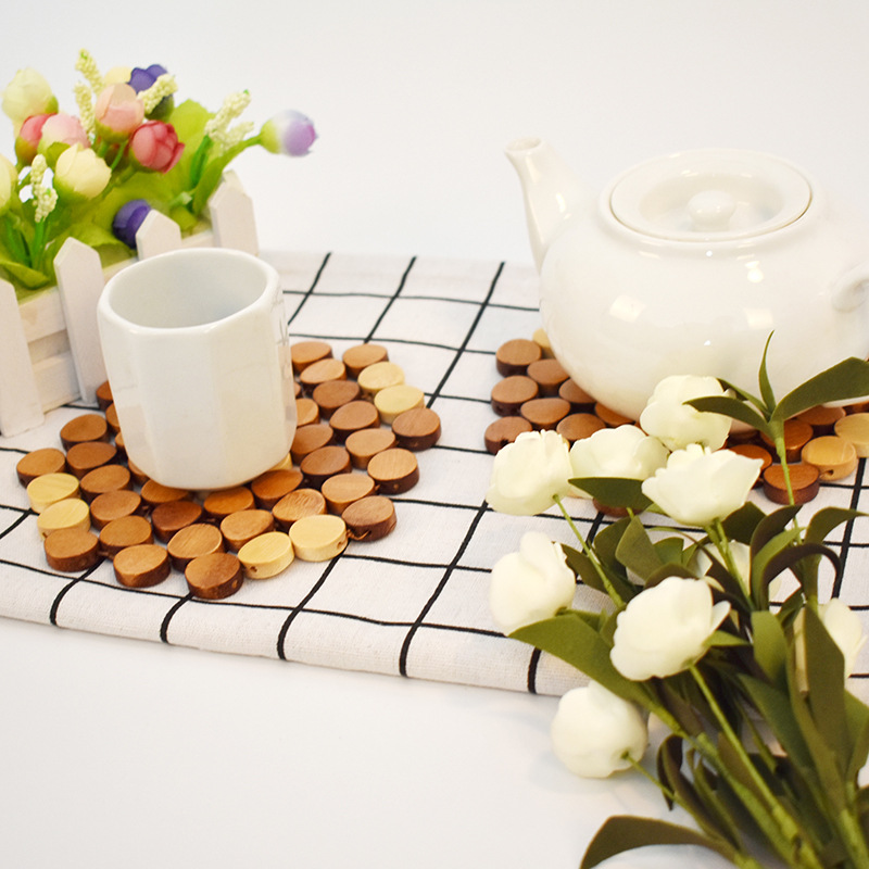 Jiehao Factory direct sales of small-sized coasters, household bowl MATS, bamboo heat insulation pads, thickened hollowed-out bamboo placemats, and anti-slip table MATS Application Scenario