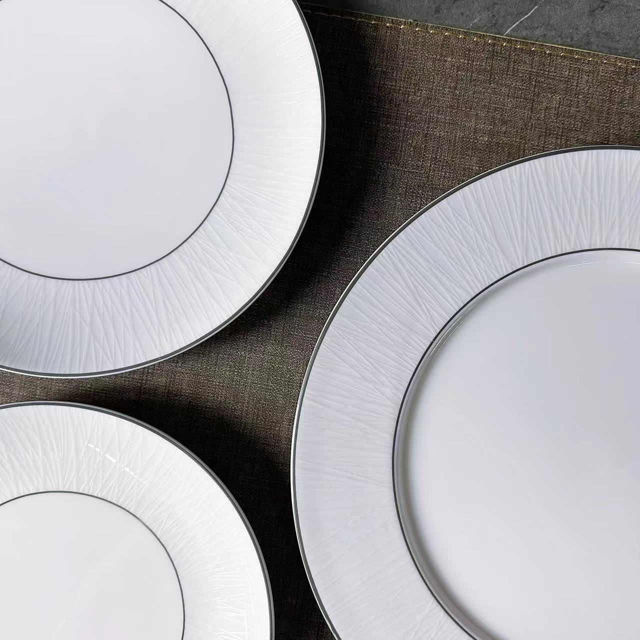 Silver-edge cypress Series ceramic tableware set. The silver-edge embossed dark pattern design is exquisite and versatile. It is suitable for hotel tableware, commercial hotels and clubs Specification image