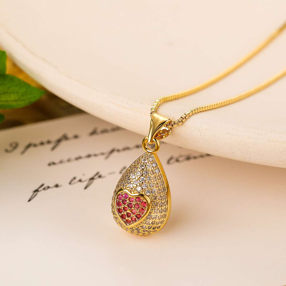 A unique 18K gold-plated zircon water drop pendant necklace from Europe and America, a fashionable, light luxury and high-end collarbone chain for women details Picture