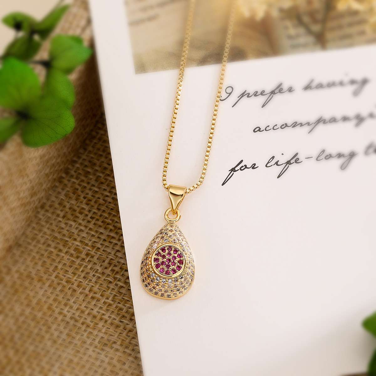 A unique 18K gold-plated zircon water drop pendant necklace from Europe and America, a fashionable, light luxury and high-end collarbone chain for women Item Picture