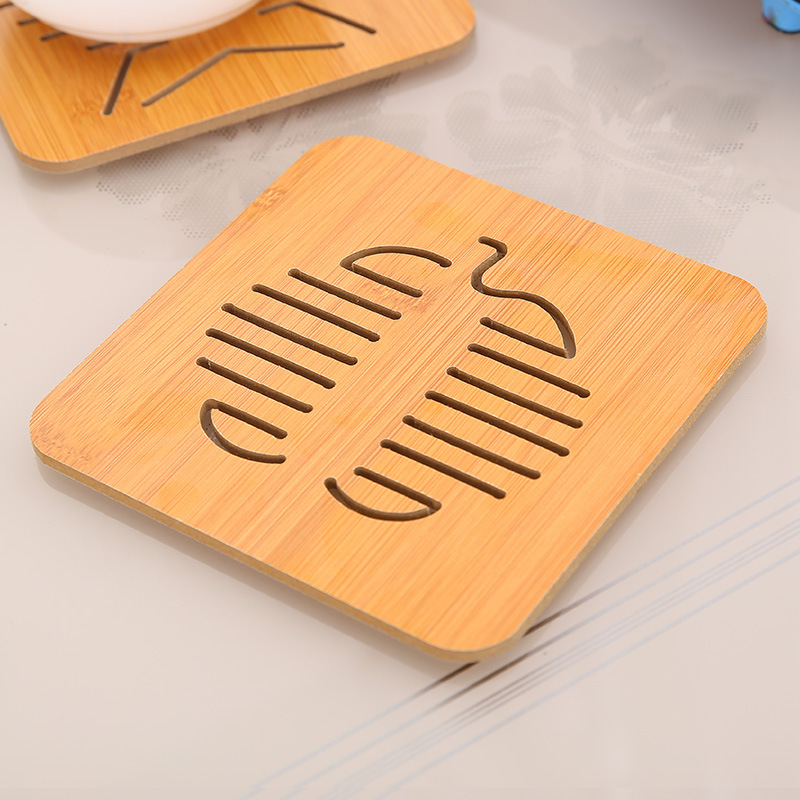 Bamboo placemats, heat insulation pads, creative cup MATS, cartoon cute table MATS, wooden bowl MATS, household hollowed-out cup MATS