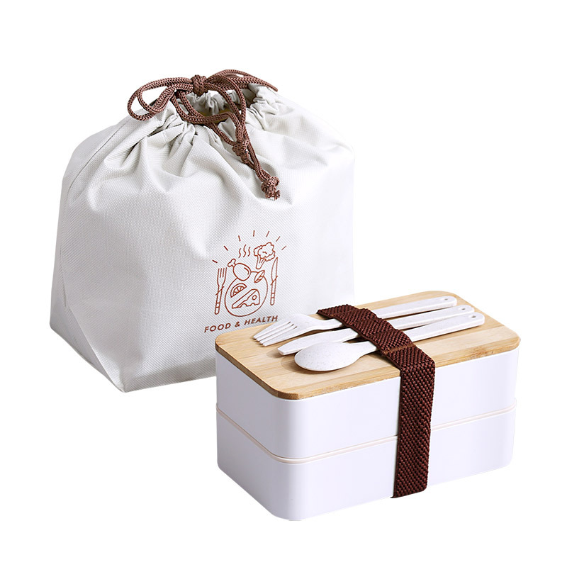 J129-XC-539 Bamboo and wood lid double-layer plastic lunch box, microwave portable lunch box set for students Application Scenario