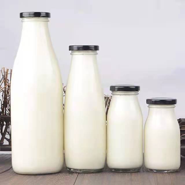 Fabricante al por mayor en stock botella de leche con boca de seda botella de leche fresca botella de yogur botella de bebida botella de vidrio vacío transparente detail image 1