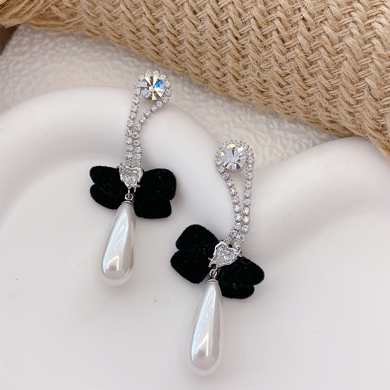 蝴蝶结/925银针/气质高级产品图