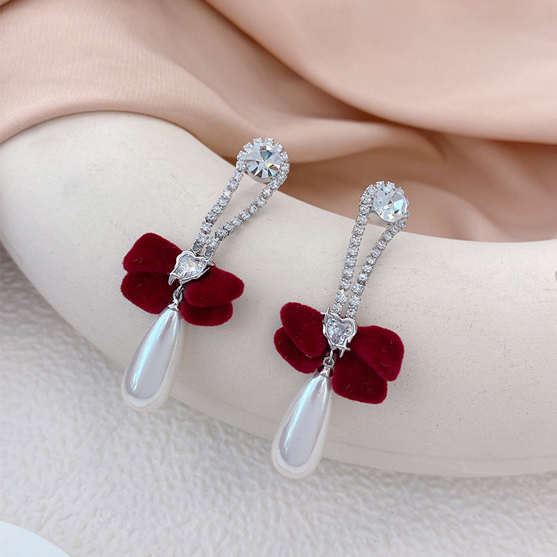 2023年新款黑红色蝴蝶结长款椭圆珍珠耳钉女气质高级感925银针耳饰