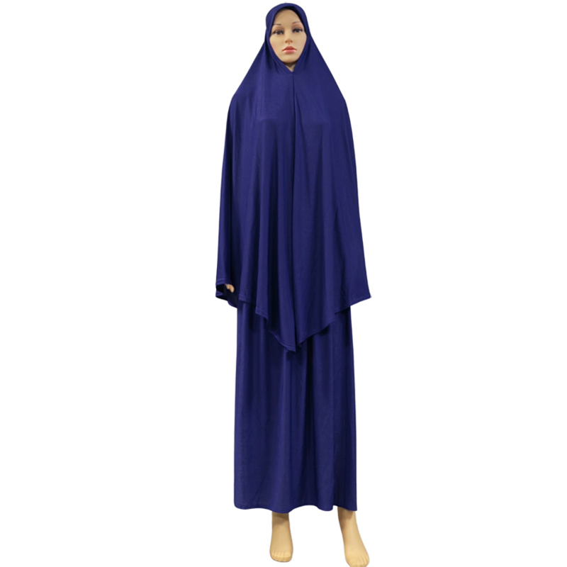 A two-piece Muslim solid-color long dress set is an elegant and fashionable factory bestseller. A two-piece hooded long headscarf skirt set is an elegant and fashionable women's style with a solid color and high quality